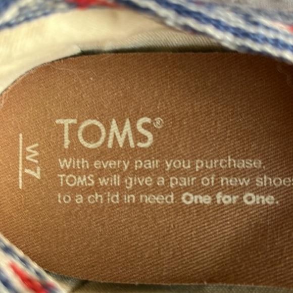 Toms denim look slip ons with navy blue and orange Aztec trim. Size 7 - Picture 8 of 8